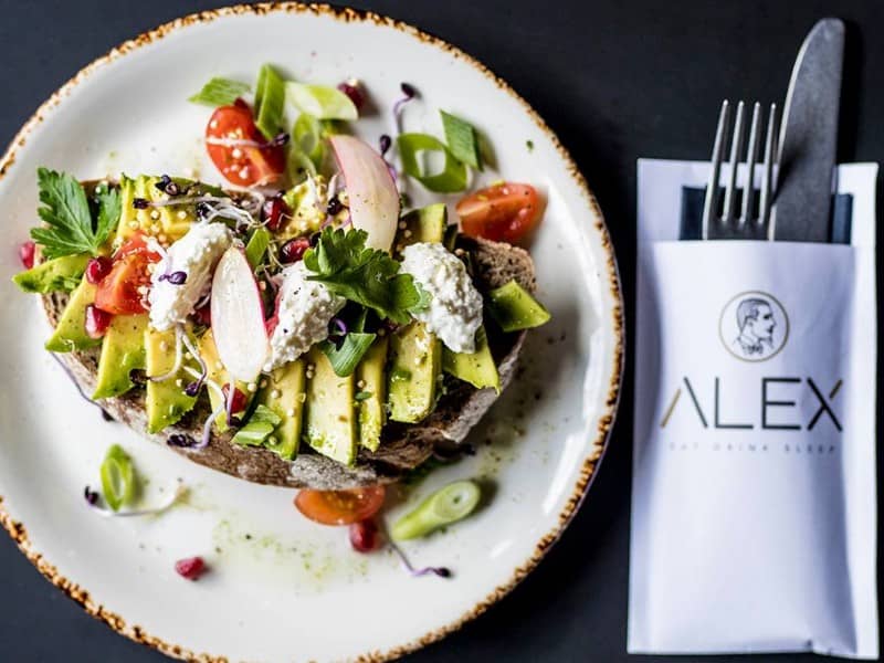 Plate with avocado sandwich Alex restaurant Maastricht | Kaboom Hotel